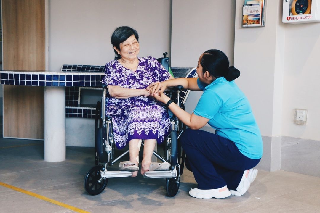 A companion care nurse with a resident