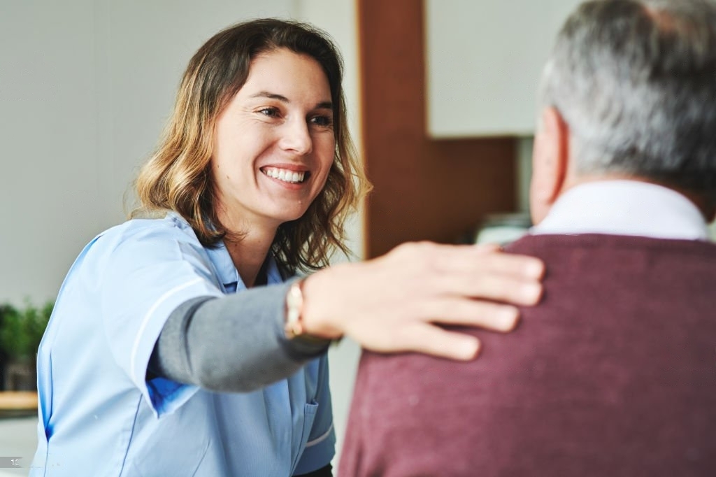 Caregiver touching a guest